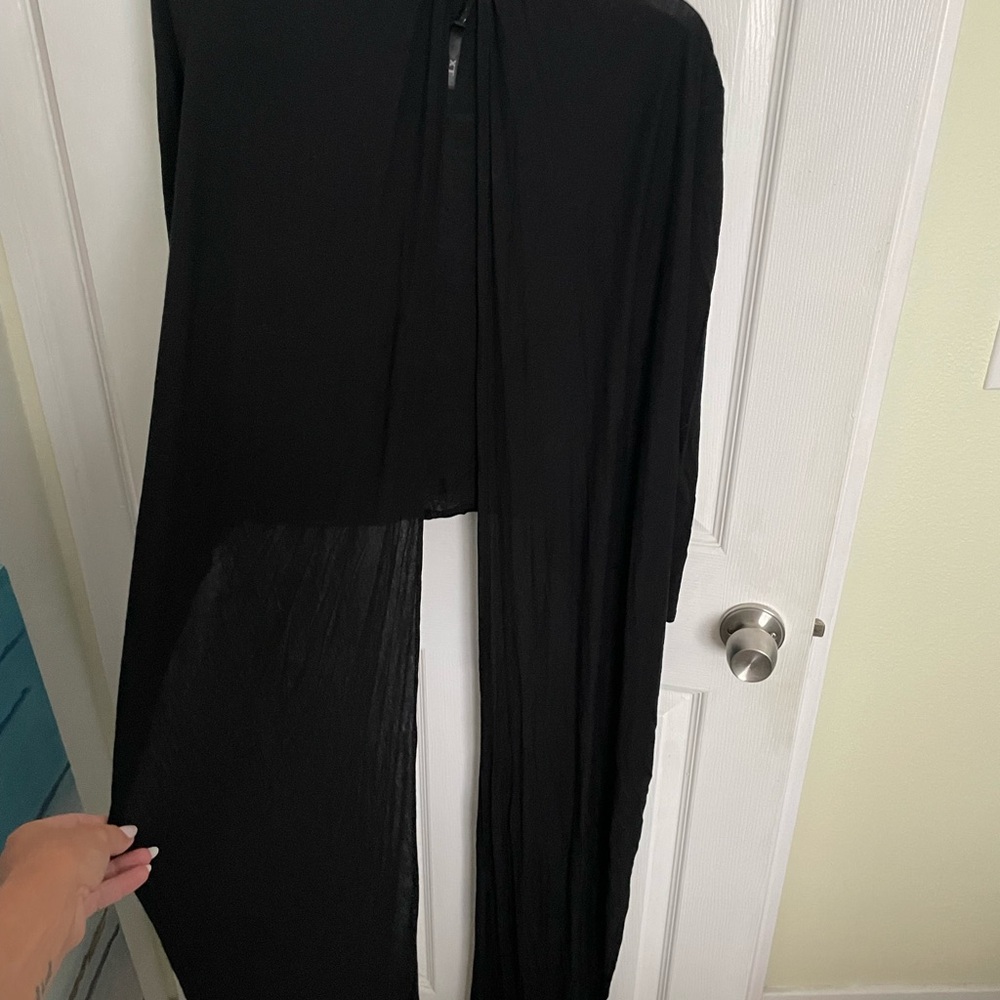 XT brand. Black wrap, ballet style. One size/large. A few ways to wear it.